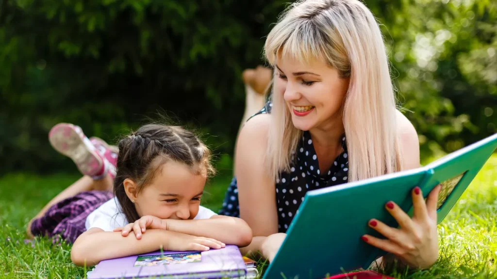 mother daughter girl read book