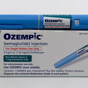 Ozempic pen and box on white background with copy space