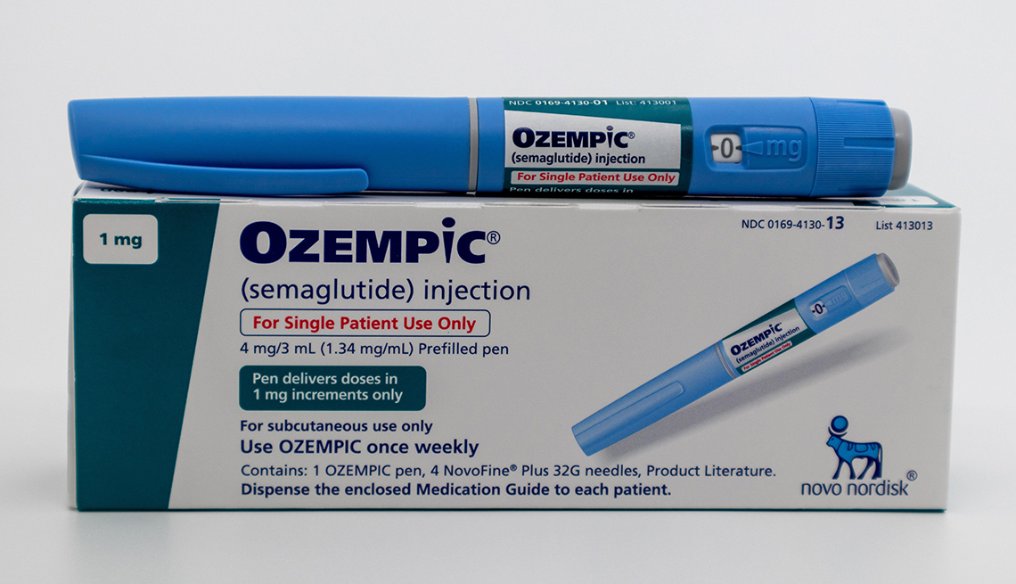 Ozempic pen and box on white background with copy space