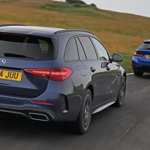 BMW 330e vs Mercedes C 300 e twin test rear cornering u6ejwm 11zon