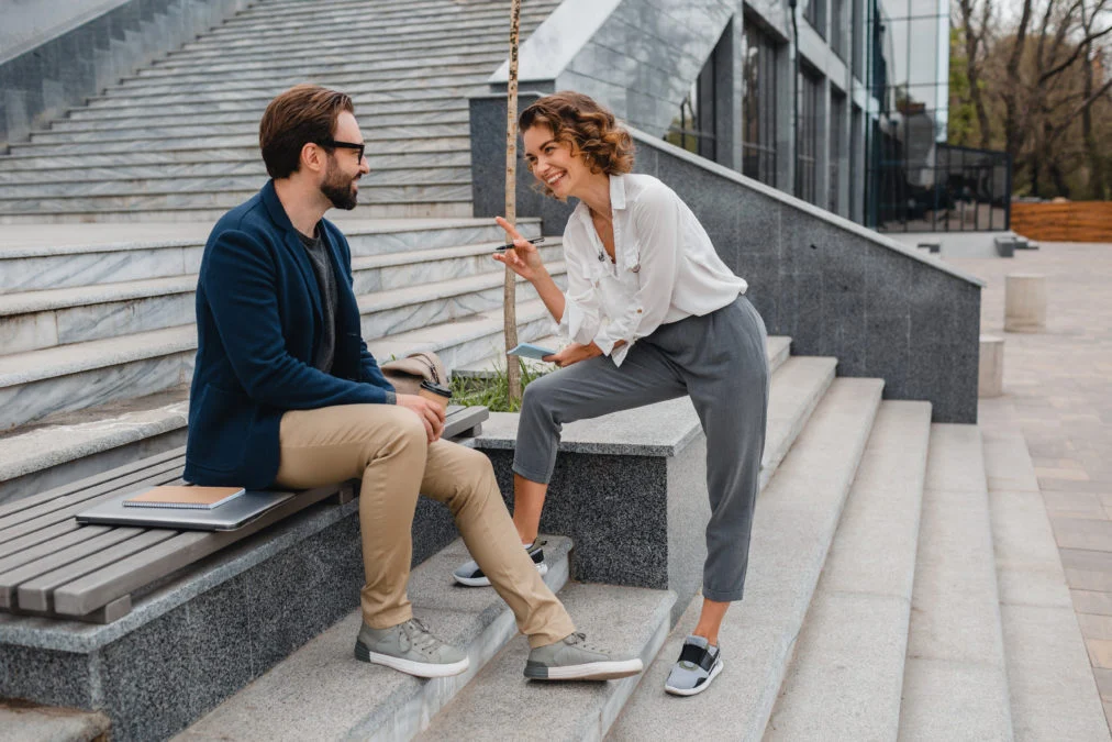 attractive couple man woman talking urban city center discussing 1012x675.jpg