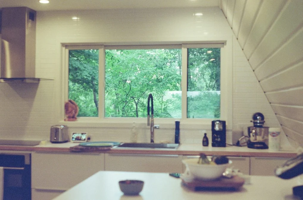 monica hudec T5 le V47rg unsplash a kitchen with a sink stove dishwasher and a window 1018x675.jpg